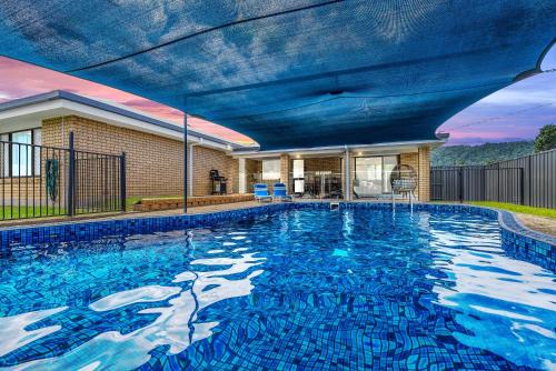 Family Retreat - A Spacious Poolside Stay