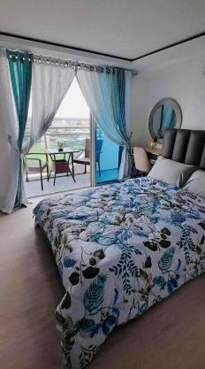 Family Room in Azure North Pampanga near Malls, Airport and NLEX