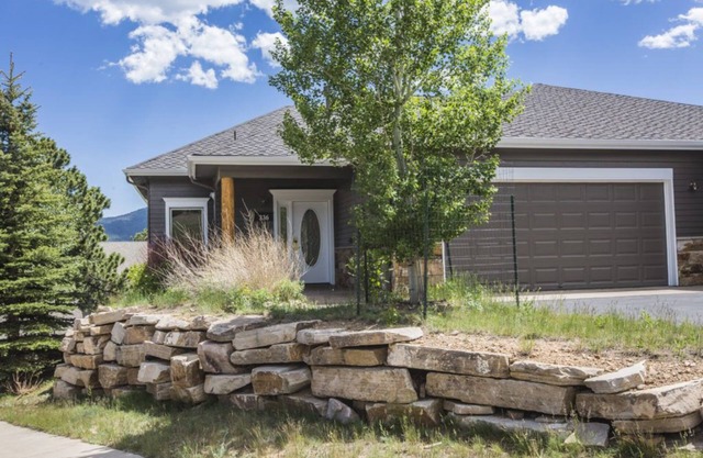 Family-sized condo with large deck, private hot tub, and bunk beds!