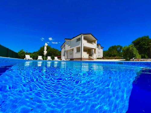 Family Villa Jela for 12 guests with pool