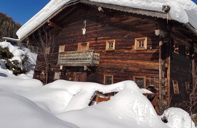 Fantastic mountain hut from 1550 close to the stream