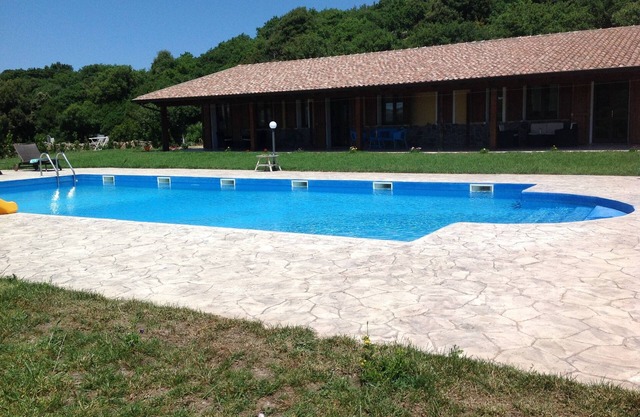 Casa rural "Sa Raighina house center" con gran piscina compartida