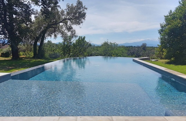 near beaches, nature and swimming pool with view of Canigou