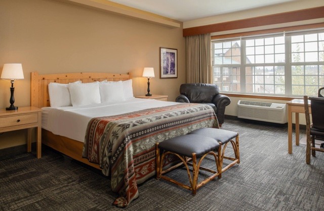 Find Comfort in Our Spacious Rooms w/ Cozy Lodge Atmosphere