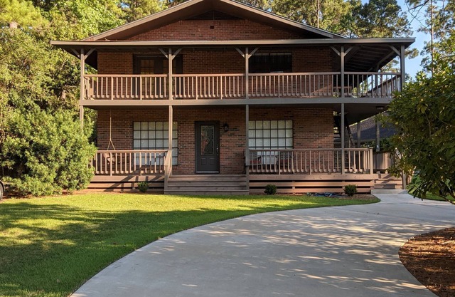 Fishers Foxhole - two story home with wrap around deck and lake access.