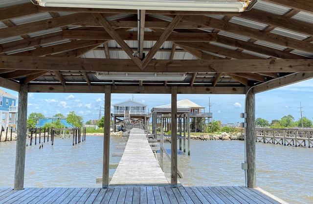 Fishing and crabbing directly on Lake Pontchartrain from pier w/covered landing