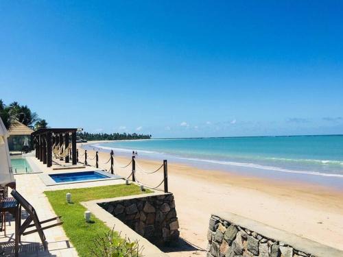 FLAT ENCANTADOR PÉ NA AREIA 2 SUÍTES- WATERFRONT