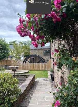 FLOUR MILL HOUSE at PITKERRO MILL, 4 double bedrooms, TVs, 3 en-suite, separate shower, wc, fully equipped kitchen, games room, large family lounge, private parking, WiFi, private garden and courtyard, long stay rates available through Honeycomb Hosts