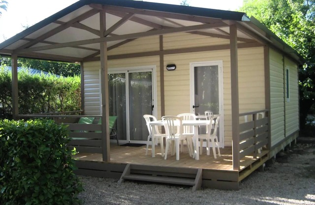 Flower Camping le Pilon d'Agel *** - Chalet Soléa Comfort 40m2 - 2 bedrooms + air conditioning + TV - of which covered terrace of 13m2 5 people