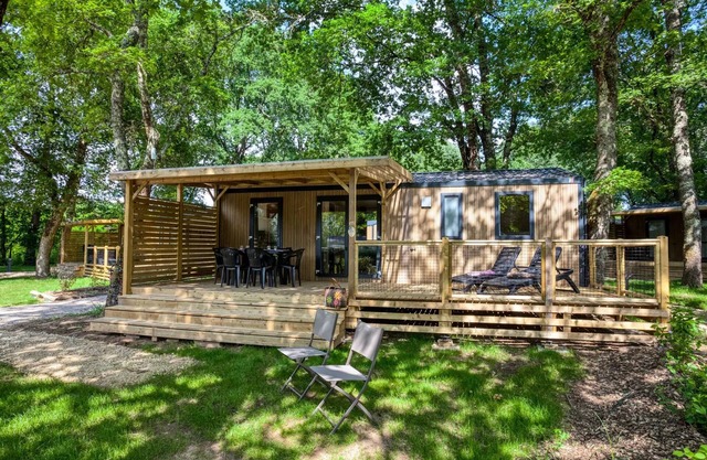 Flower Camping LES BERGES DE LA DORDOGNE **** - Mobil-Home Premium 33m2 Bahia - 3 bedrooms + semi-covered terrace +LV + TV + CLIM 6 people