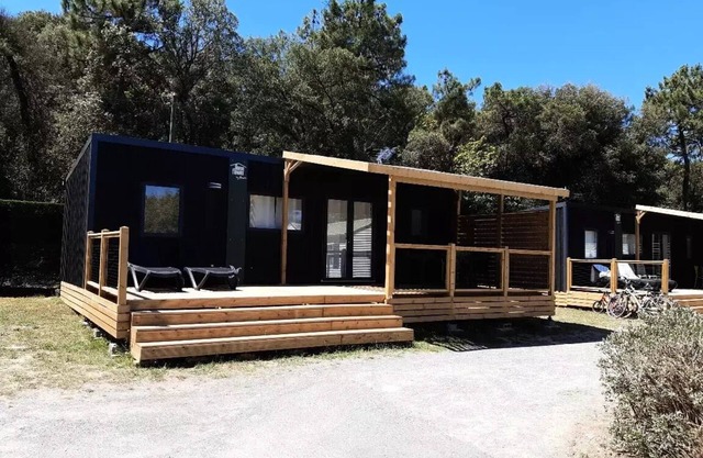 Flower Camping Olivigne *** - Homeflower Premium 35 m2 3 bedrooms + terrace 21m2 + TV + LV + Clim + Plancha 6 people