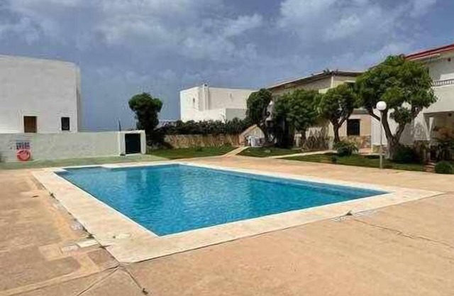 Forcat - Apartamento bajo con jardín y piscina.