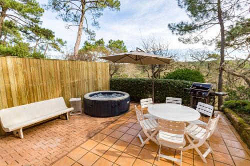 Forest flat/Terrasse-spa-bbq-10min à pieds de la plage