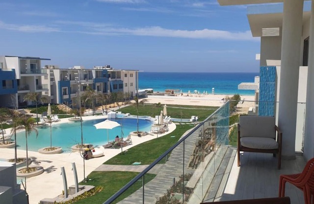 Fouka Bay North Coast 2BRs Modern Style Serviced Apartment with Open Pool & Sea View