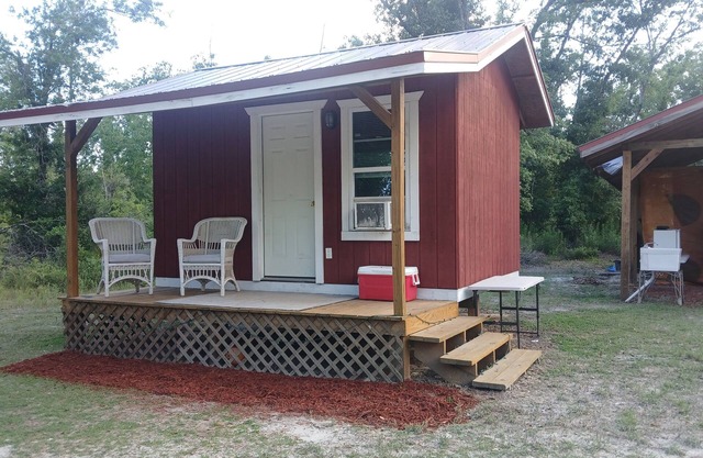 Friendlys River Retreat private Rustic Camping Cabin sleeps 4+with tent camping