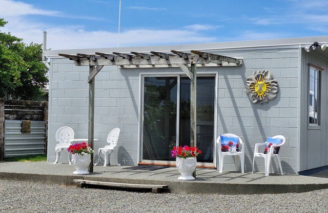 Fully self contained unit with separate bedroom on beachfront property,