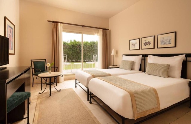 Fun Awaits in Spacious Balcony Room by Beach with Pool- Perfect for Couples