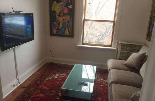 Furnished 2 bedroom flat on 3rd Floor of downtown family home. Walk everywhere!