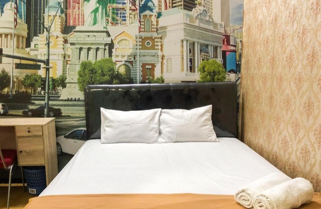 Gangnam Hotel near Mall Olympic Garden Malang Mitra RedDoorz