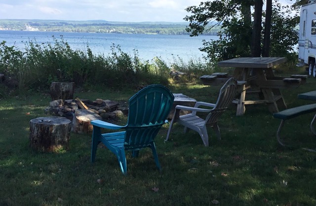 Get lulled to sleep by Lake Superior in Vintage camper 5 steps from the water