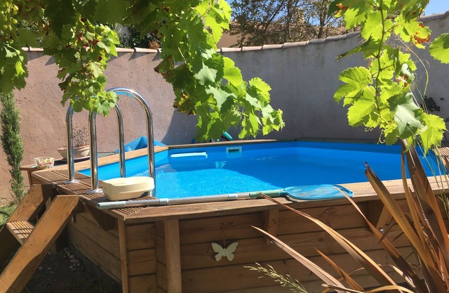 Gite with swimming pool and patio.