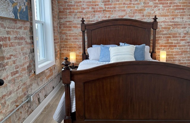 Golden Acre Suites | 3BR Downtown Loft w/ Exposed Brick & Urban Charm