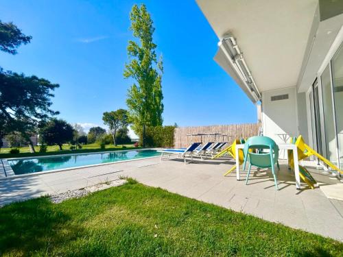 Golden hour retreat lagoon view villa with pool