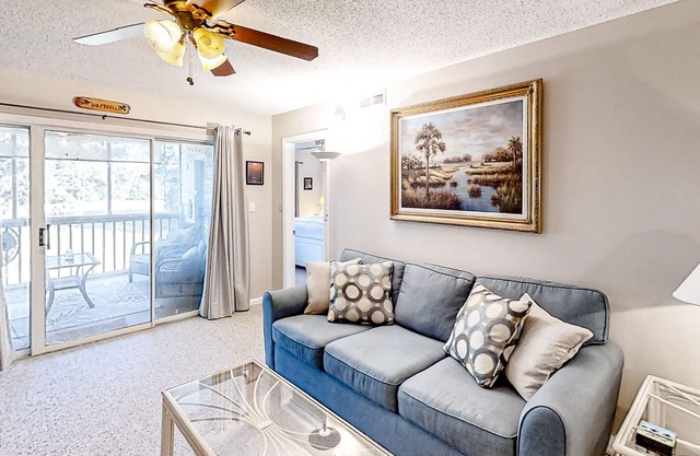 Golf course community condo with fairway views, on-site pool, & balcony