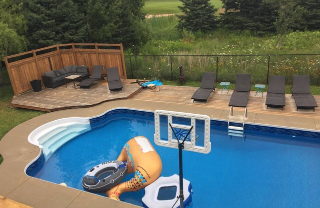 Golf, Swim & Repeat 5 Bedroom home with inground pool on golf course