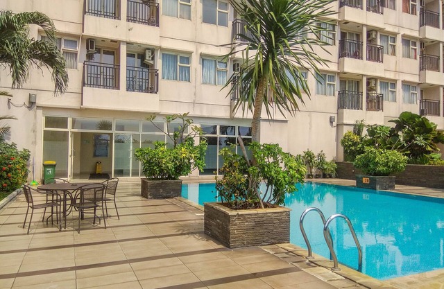 Good Homey and Simply Studio Margonda Residence 3 Apartment