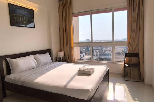 Goodstay Sunlit Bliss Cozy2BHK with Luxe Touch704