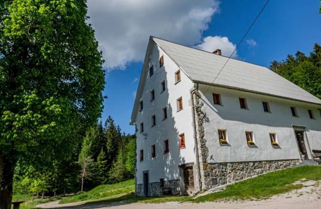 House is located in a quiet area, surrounded by meadows, forests and a stream.