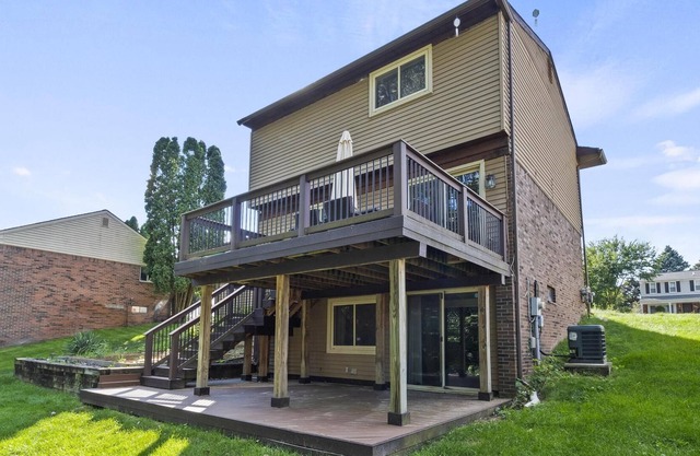 Gorgeous home W/ a ton of Space Over looking the Woods
