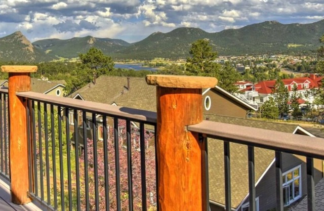 Condo with a hot tub, steps from The Stanley! #320 (6167)