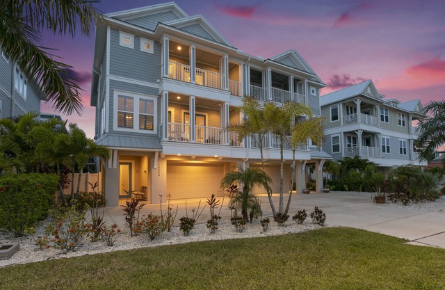 Gorgeous Sunsets in this beautifully appointed Townhouse steps from the Beach