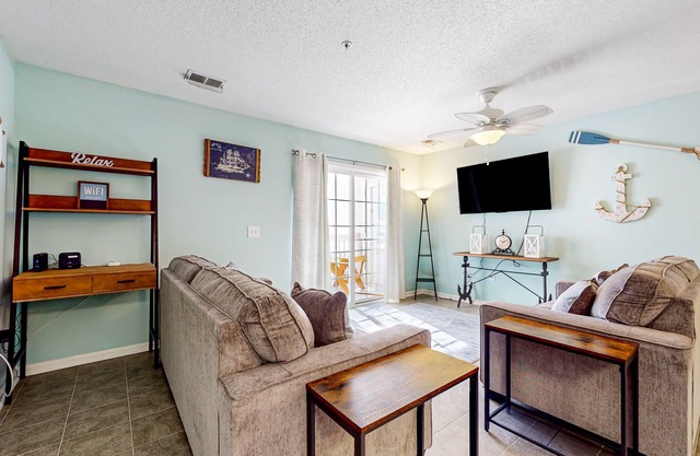Ground-floor condo next to Colonial Charters Golf Club, near the beach
