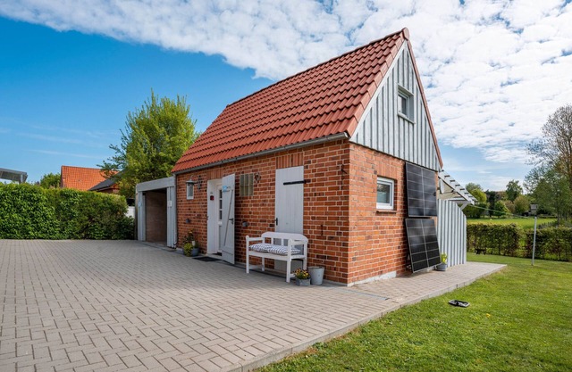Casa de huéspedes "Bezauberndes Lütt Hus" con terraza privada, jardín compartido y Wi-Fi