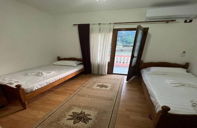 Guesthouse Space in Përmet provides accommodations with a garden.