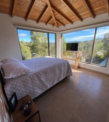 Habitación con baño privado en casa de campo ubicada en Santa Elena
