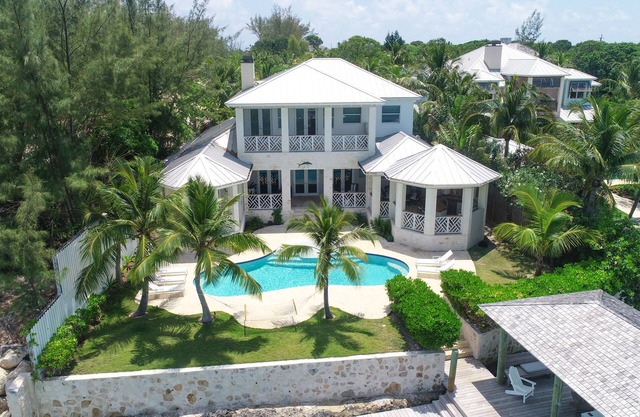 Harbor Island Oceanfront Escape. Private Dock, Heated Pool & Sunset Views.