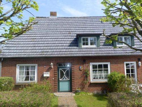 Haus 94- Whg EG