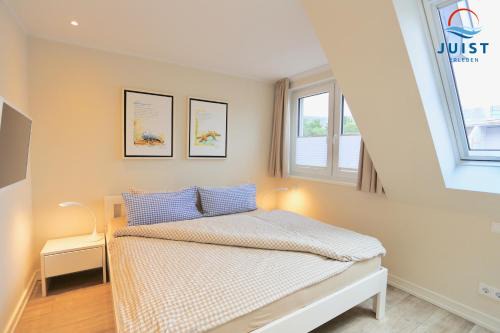 Haus Achterhus 214 - Wohnung 14 "blauer Anker"