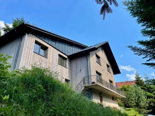 Haus am Erzbach - Ferienwohnung mitten in der Natur