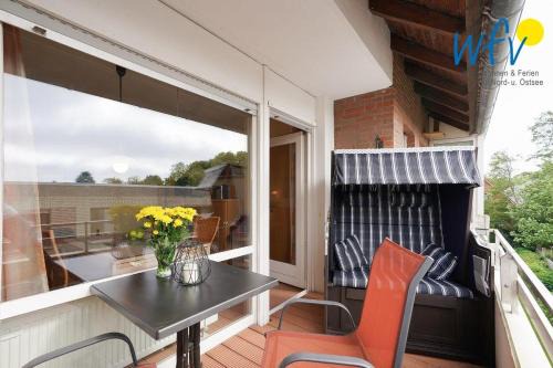 Haus Kiebitz Ferienwohnung "Strandkoerbchen"