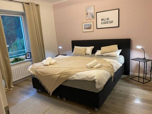 Haus mit Garten - Kingbett - WIFI - Parkplatz