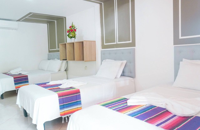 Espaciosa Habitación Familiar: Junto a la Playa