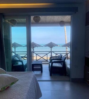 Hermosa Suite a un metro del mar en playa privada