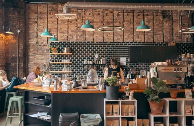 High Ceilings & Windows + Exposed Brick + Central