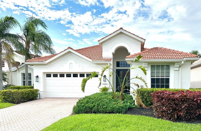 High end retreat in Miromar Lakes with private pool