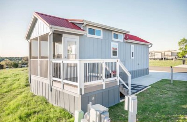 Hilltop Tiny Home Features Screened Porch, Reading Nook with Twin Bed, and BBQ Grill with Indoor Fir